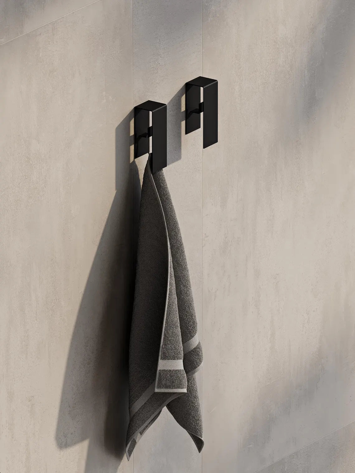 Ganci da parete in metallo nero per il bagno