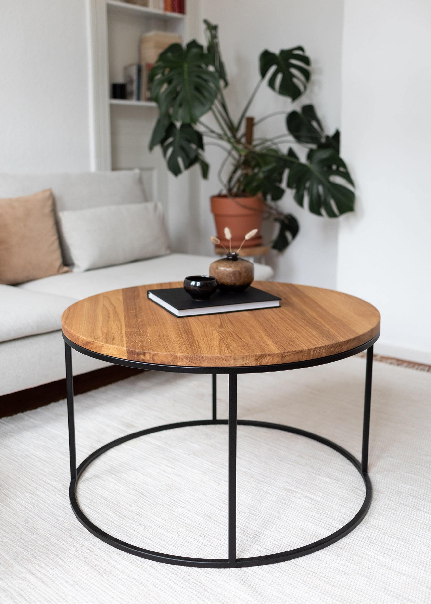 coffee table
coffee tables
wood coffee table
metal coffee table
wood and metal table
round coffee table
round table
coffee table wood
living room table
big coffee table
natural wood table
unique coffee table
unique table