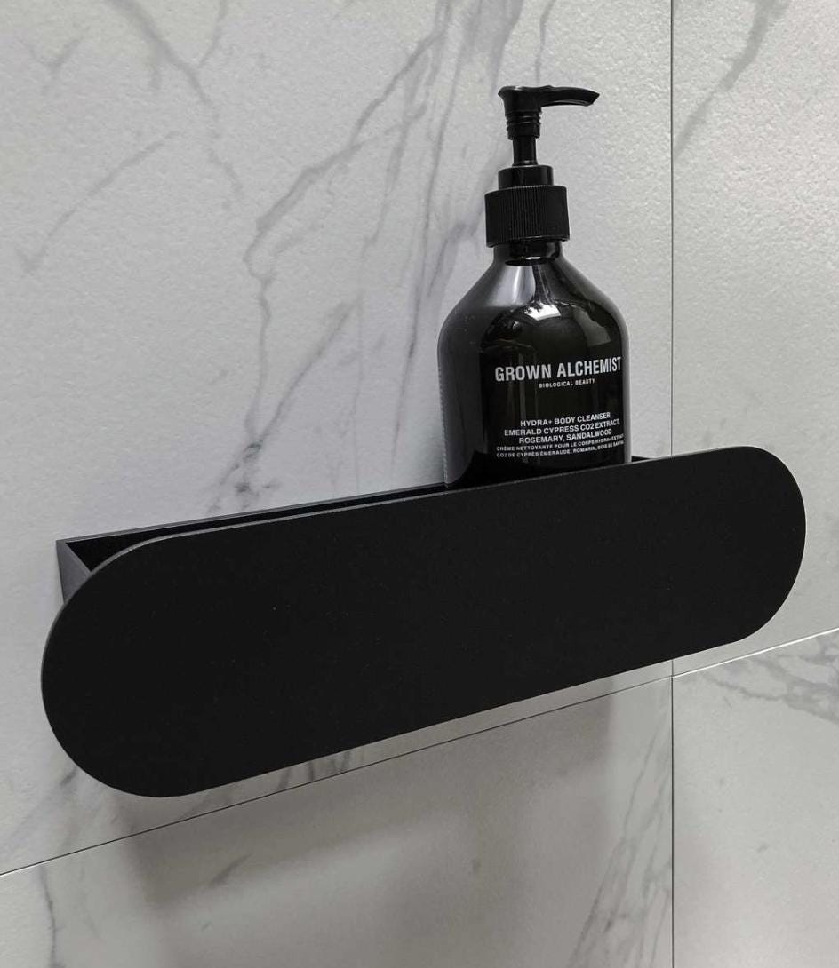 bathroom organizer
bathroom shelf
bathroom wall shelf
floating shelf
bathroom accessories
wall mounted shelf
shower wall shelf
waterproof shelf
hidden mount shelf
long bathroom shelf
narrow shower shelf
accent shower shelf
shelf for cosmetics