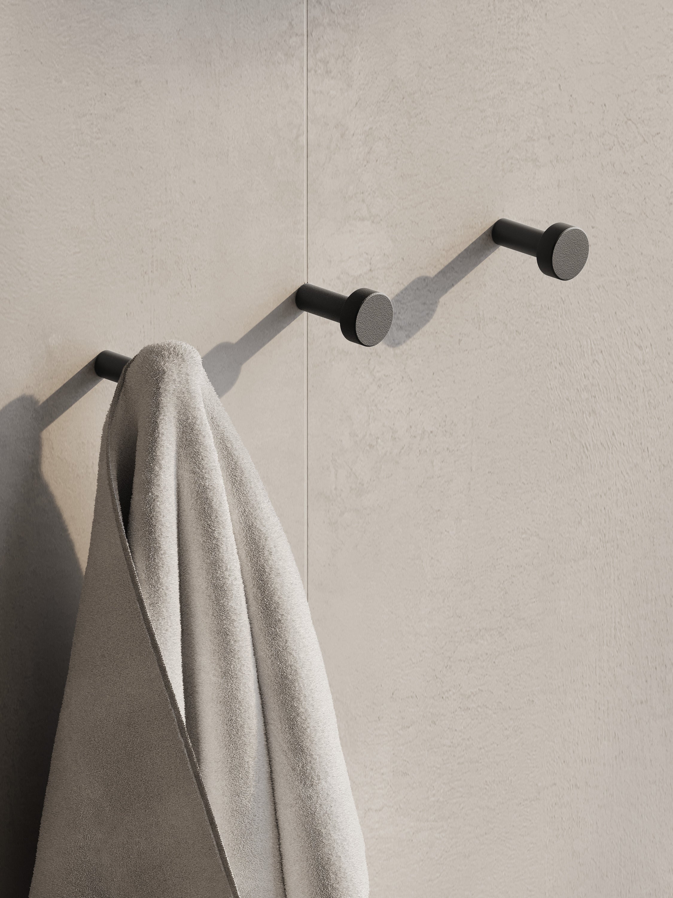 Gancio da parete in acciaio per bagno