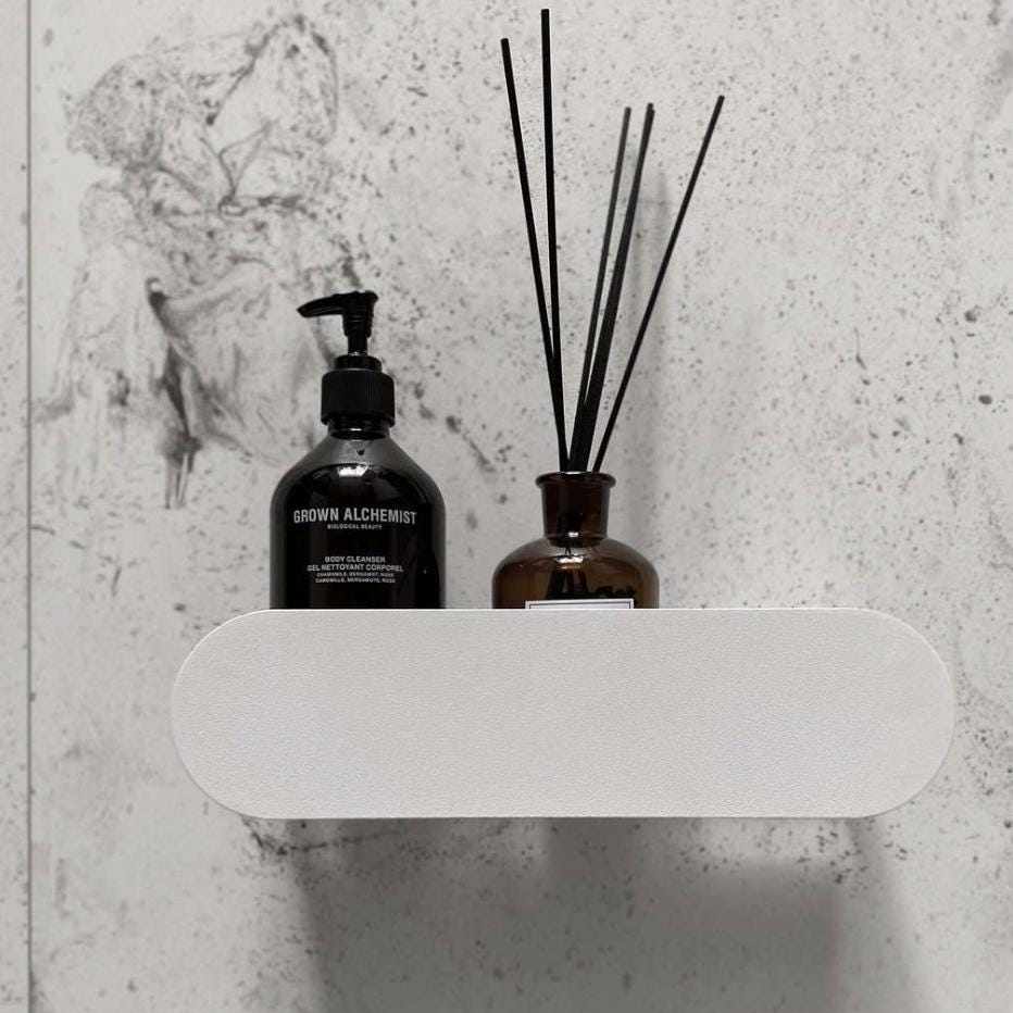 bathroom organizer
bathroom shelf
bathroom wall shelf
floating shelf
bathroom accessories
wall mounted shelf
shower wall shelf
waterproof shelf
hidden mount shelf
long bathroom shelf
narrow shower shelf
accent shower shelf
shelf for cosmetics